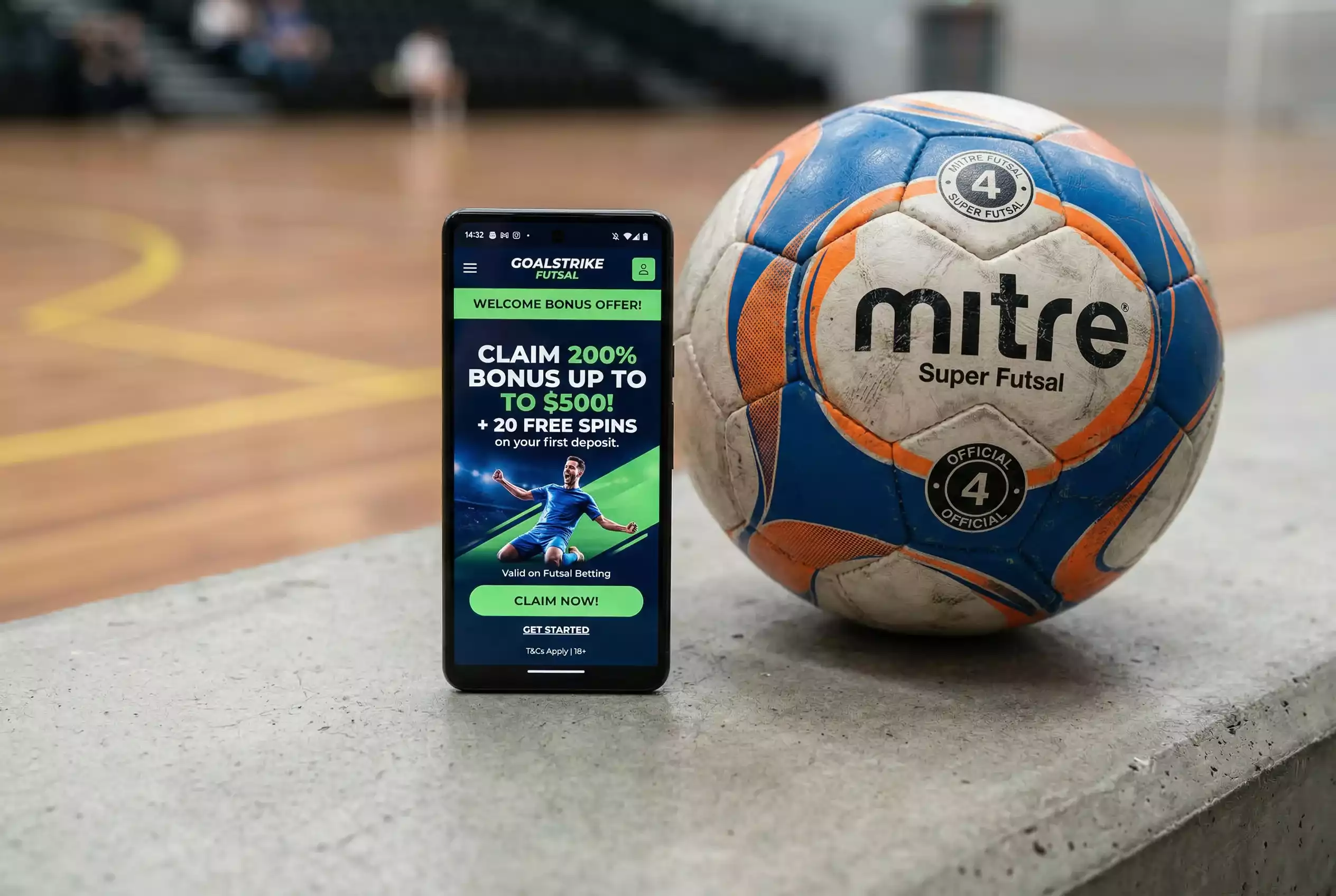 Telemóvel com oferta de bónus de boas-vindas e bola de futsal ao lado